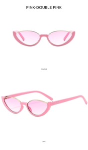 Detail of pink cat-eye sunglasses with gold metal trim and gradient lenses