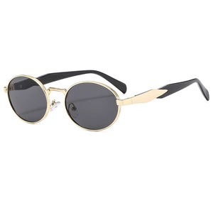 Retro oval metal sunglasses with golden frame and dark lenses for UV protection