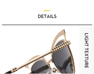 Detail der goldenen Metallsonnenbrille mit strukturierte Scharniere und Katzenaugenlinsen