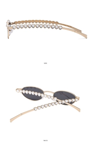 Detailansicht der goldene Oval-Sonnenbrille mit Herz-Strasssteinen an den Bügeln