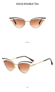 Detail der goldenen Cat-Eye-Sonnenbrille mit Teeglas-Verlauf und strukturierten Bügeln