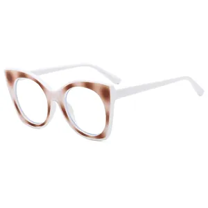Retro cat-eye glasses frame with white temples and tortoise shell pattern accents