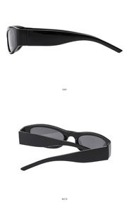 Detaillierte Seiten- und Rückansicht der schwarzen Vintage-Sportsonnenbrille mit breitem Rahmen