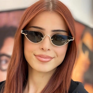 Fashionable half-frame cat eye metal sunglasses with gold hollow flower pattern design
