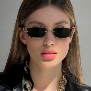 Fashionable half-frame square sunglasses with silver metal frame and dark gray lenses