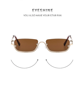 Detailed view of square half-frame sunglasses with gold metal temples and brown lenses
