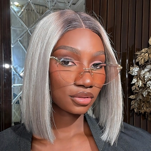 Schicke randlose Cat-Eye Sonnenbrille mit orangefarbenem Verlauf und Perücke