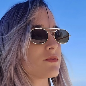 Classic double-bridge aviator sunglasses with gold metal frames and dark polarized lenses