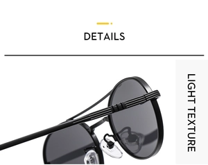 Macro view of metal hinges and textured temples on vintage oval double-bridge sunglasses