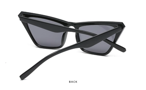 Detailed back view of black cat-eye sunglasses with gray lenses and curved temples