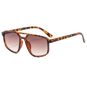 Classic aviator sunglasses with tortoise frames and brown gradient lenses for men