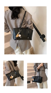 Three-way split view of a large black faux leather tote bag with a baseball charm