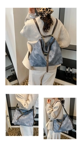 Detailed view of vintage denim tote bag showing adjustable straps and versatile dual-carry style