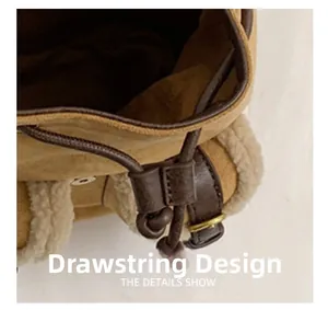 Detail view of the drawstring design featuring faux suede and cozy fleece trim