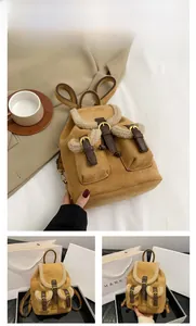 Detail view of mini plush backpack featuring brown faux suede and cream shearling trim