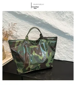 Detail view of a glossy camouflage tote bag featuring high-capacity design and sturdy straps