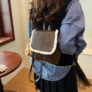 Retro brown leather mini backpack with white fleece trim and cute bear keychain charm