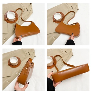 Detail of caramel brown PU leather shoulder bag showing smooth texture and silver logo