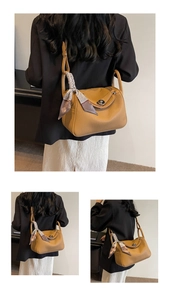 Detailed side view of brown lychee grain leather bag with silver buckle and silk scarf