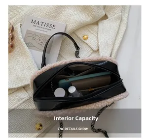 Internal capacity of the crossbody bag showing space for phone, wallet and cosmetics