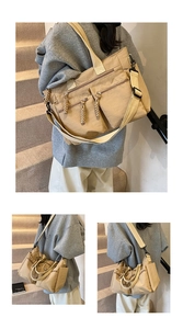 Detail view of khaki corduroy tote bag showing multiple zipper pockets and braided pulls