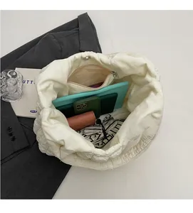 Top view of spacious interior with zipper pocket showing tablet and daily essentials
