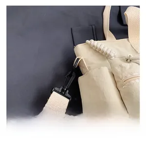 Detail view of premium hooks and zipper on minimalist corduroy large capacity bag