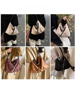 Outdoor lifestyle view of large capacity tote bag in beige, brown, and black finishes