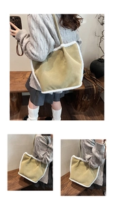 Detail of suede shoulder bag with white faux shearling trim and large capacity