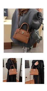 Detail of brown lychee leather handbag with silver lock and detachable strap