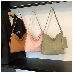Three minimalist large capacity tote bags in tan, pink and green suede material