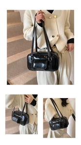 Detail of black faux leather shoulder bag featuring white contrast stitching and front pocket