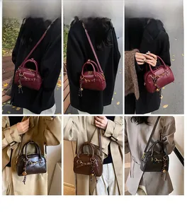 Three colors of vintage Boston bags shown on models for stylish crossbody and handbag styling