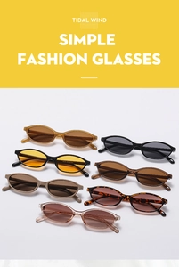 Flat lay of retro oval sunglasses in various colors including amber and tortoiseshell