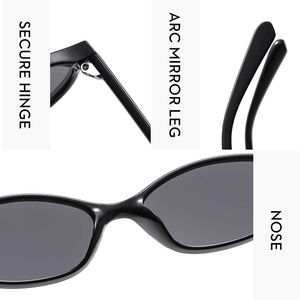 Detail of vintage oval sunglasses featuring secure hinges and comfortable nose pads
