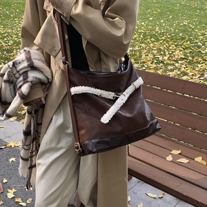 Brown large capacity leather Hobo tote bag with white plush trim and metal ring hardware