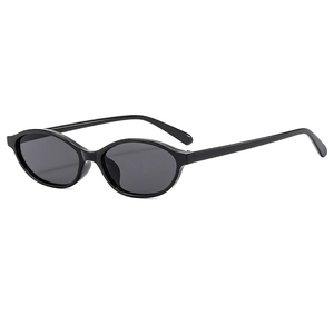 Vintage oval sunglasses with black frames and dark grey lenses in 45-degree side view
