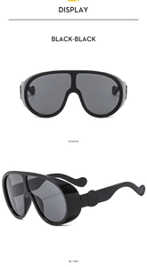 Vue de face et à 45 degrés de lunettes de soleil noires surdimensionnées tendance