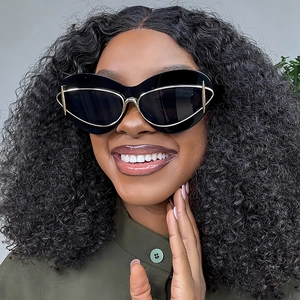 Chic oversized cat-eye sunglasses with black frame and golden metal line accents for women