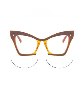 Detailed close-up of cat-eye glasses frames in dark brown and amber tortoise finish