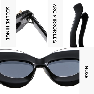 Detail view of reinforced metal hinges and ergonomic temples on black cat eye sunglasses