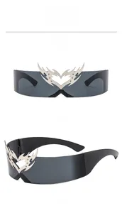 Front and side views of Y2K rimless sunglasses featuring a silver flame heart metal detail