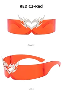 Detail view of red rimless sunglasses with heart and flame metal decorative accents