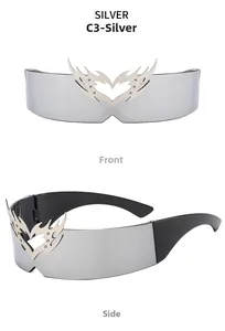 Detail of silver shield sunglasses with futuristic wing heart metal accent and mirrored lens