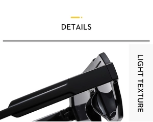 Detailed close-up of glossy black double-bridge aviator sunglasses with light texture