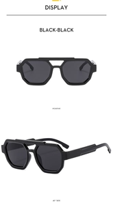 Black geometric aviator sunglasses with unique double bridge frame and dark grey lenses