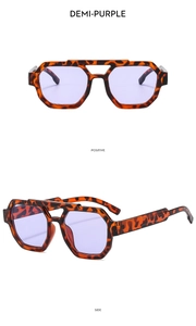 Detail view of double bridge aviator sunglasses in tortoise shell frame with purple lenses