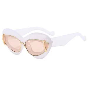 Chic heart-shaped cat eye sunglasses with white frames and orange lenses for women