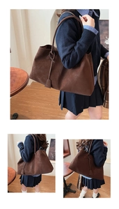 Close-up of deep brown large tote bag with matte texture and decorative knotted tag detail