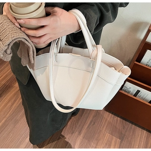 Detail view of white lychee pattern tote bag showing high-quality PU leather texture